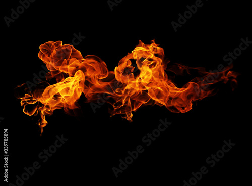 Fire flames black background © photodeedooo