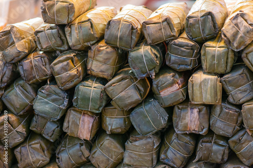 Thailand pork sausage in banana leaf package in market