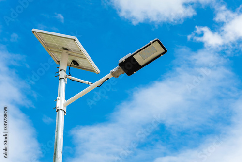 Street Light with solar panel energy with blue sky background