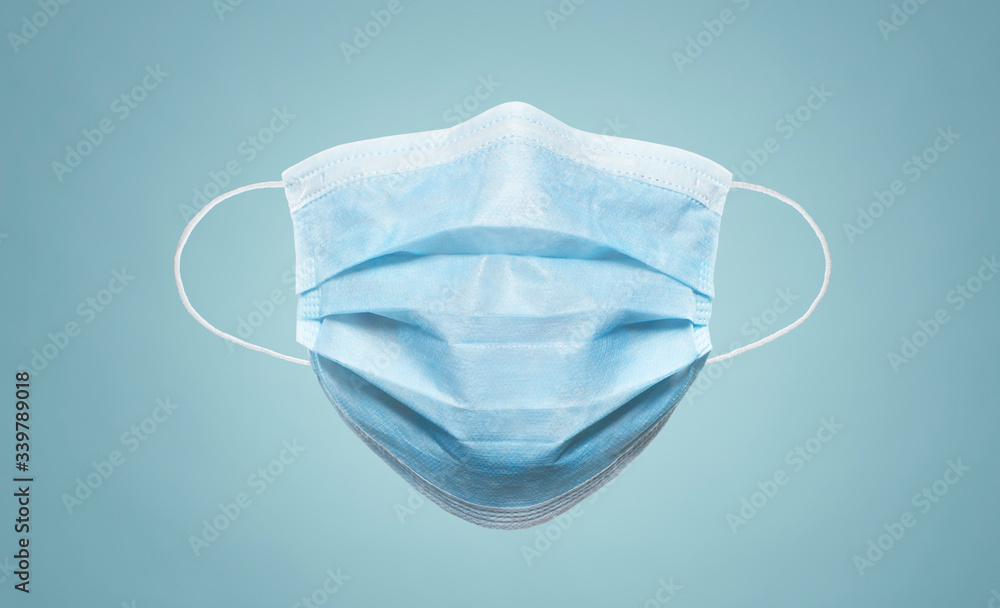 Protective hygiene mask on blue background Protective hygiene mask on blue background