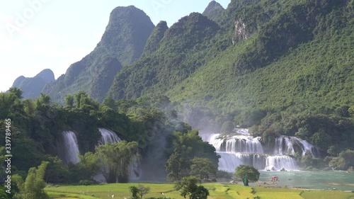 Beautiful waterfall. Ban Gioc waterfall or Detian waterfall is landmarks name of two waterfalls in border Cao Bang, Vietnam and Daxin County, China. Stock video footage Amazing landscape for travel photo