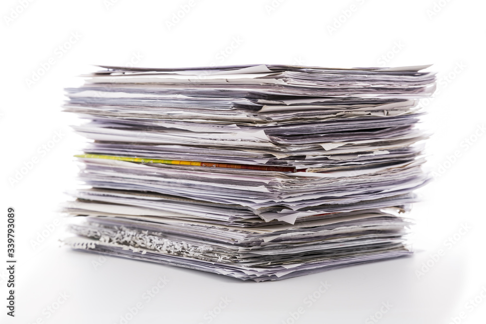 Large pile of waste paper isolated on white Large pile of waste paper isolated on white