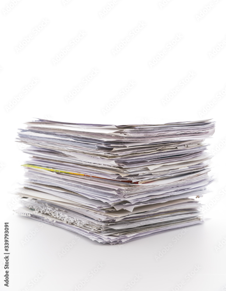Large pile of waste paper isolated on white Large pile of waste paper isolated on white