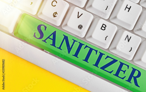 Handwriting text writing Sanitizer. Conceptual photo liquid or gel generally used to decrease infectious agents photo