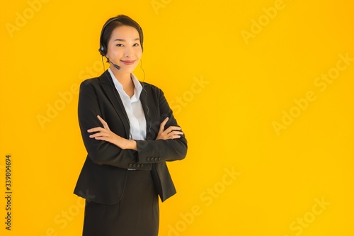Fényképezés Portrait beautiful young business asian woman with headphone or headset
