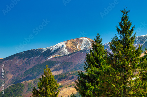 Mountain landscape in spring season, The Stoh hill in The Vratna valley at the national park Mala Fatra, Slovakia, Europe. photo