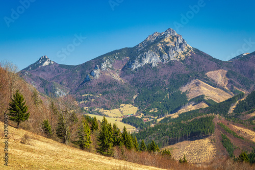 Landscape with mountains at springtime. The Great Rozsutec hill in The Mala Fatra National Park, near the village of Terchova in Slovakia, Europe. © Viliam