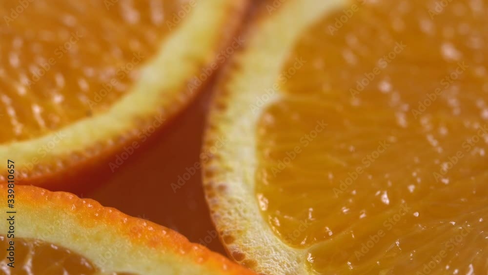 Marco shot of orange fruit and rotate.Close up flesh of orange. Marco shot of orange fruit and rotate.Close up flesh of orange.