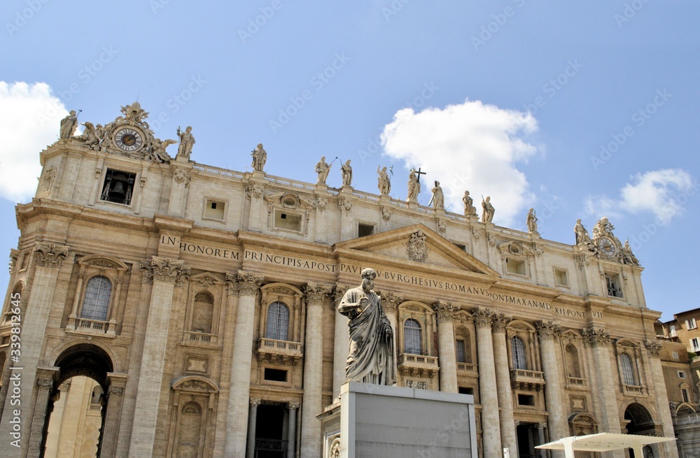 Vatican city Italy church buildings windows panorama cityscape monument blue sky clouds background 