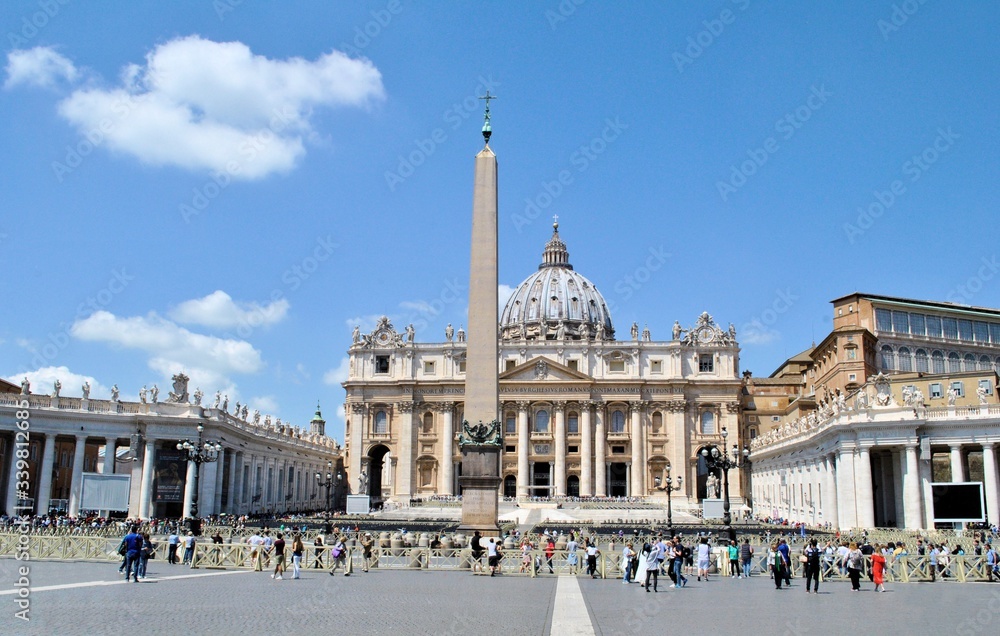 Vatican city Italy church buildings windows panorama cityscape monument blue sky clouds background 