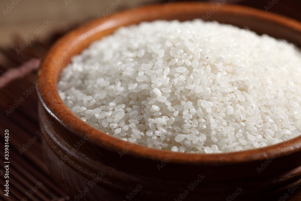 close up Japanese rice in measuring cup on table, Japanese rice in kitchen background close up Japanese rice in measuring cup on table, Japanese rice in kitchen background