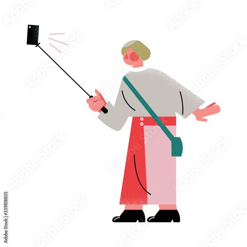 Young man standing and making selfie on smartphone with selfie stick vector illustration