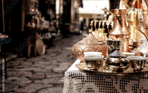 Photography Copper traditional tea, coffee pot as souvenir for visitors and tourists in Old Town Sarajevo marketplace