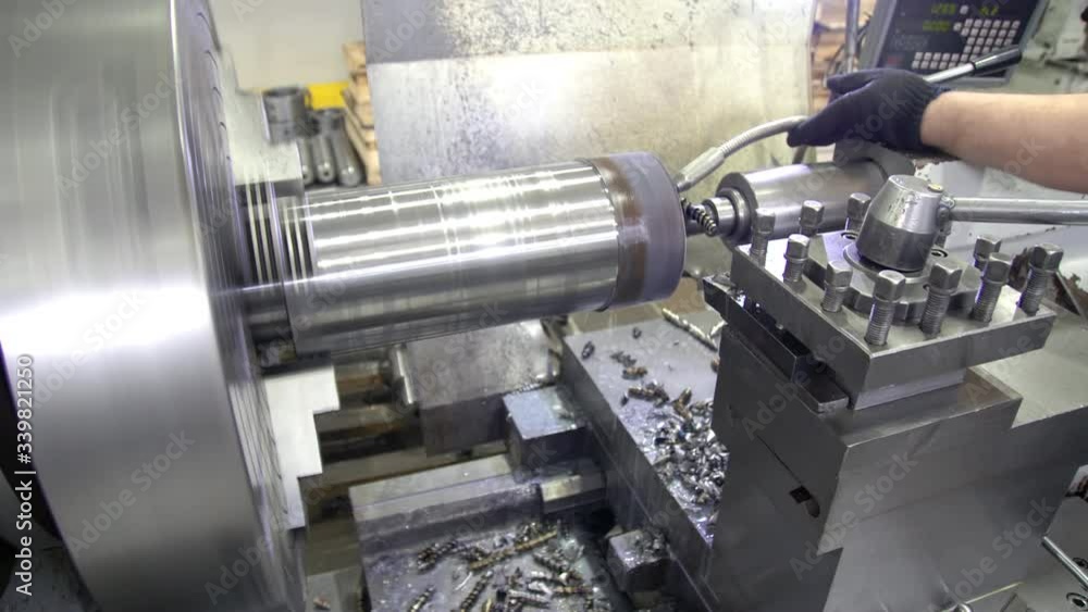 Lathe machine produces metal detail on factory. Drilling the blank on the lathe. Working lathe on metal. Mechanical equipment of heavy industry. 4k Lathe machine produces metal detail on factory. Drilling the blank on the lathe. Working lathe on metal. Mechanical equipment of heavy industry. 4k