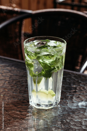 Cucumber mojito with mint and ice. Detox smoothie, summer cold drink.