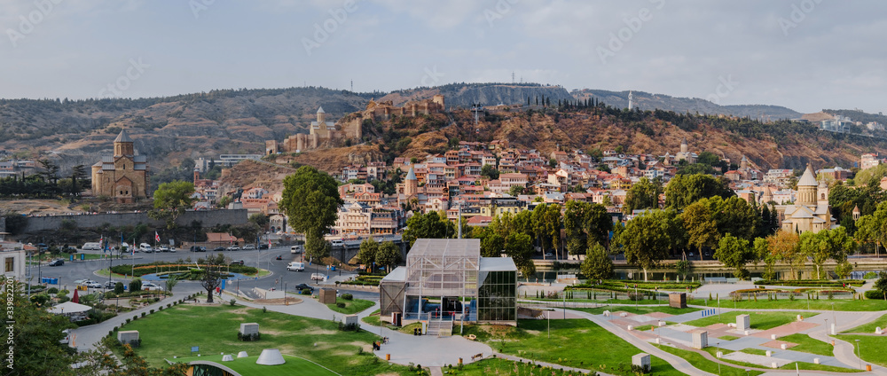 Tbilisi, Georgia. Panoramic beautiful picture of Cityscape Of Summer Old Town. Central Part Of City With Famous Landmarks.