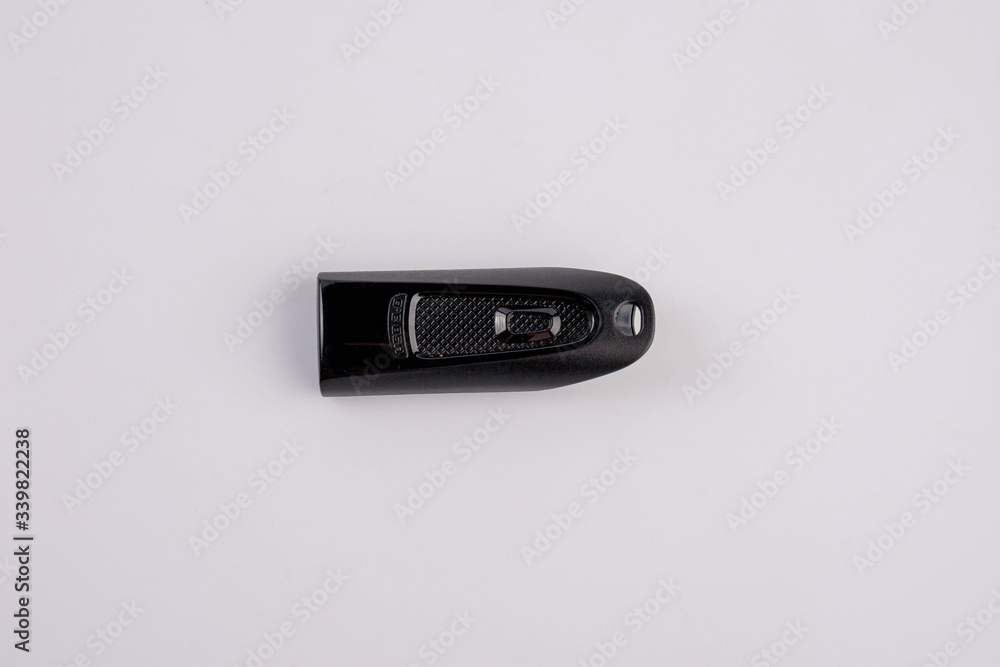 Black usb flash drive isolated on the white background Black usb flash drive isolated on the white background