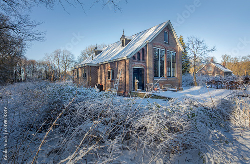 Obraz na płótnie Old schoolbuilding. Boschoord. Colonial house. Koloniehuisje. Maatschappij van Weldadigheid. Drenthe Netherlands. Winter, Snow w salonie