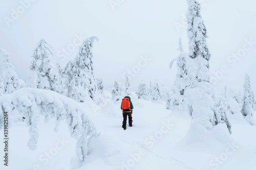 Mountaineer trekking in the snow at Lapland, Finland