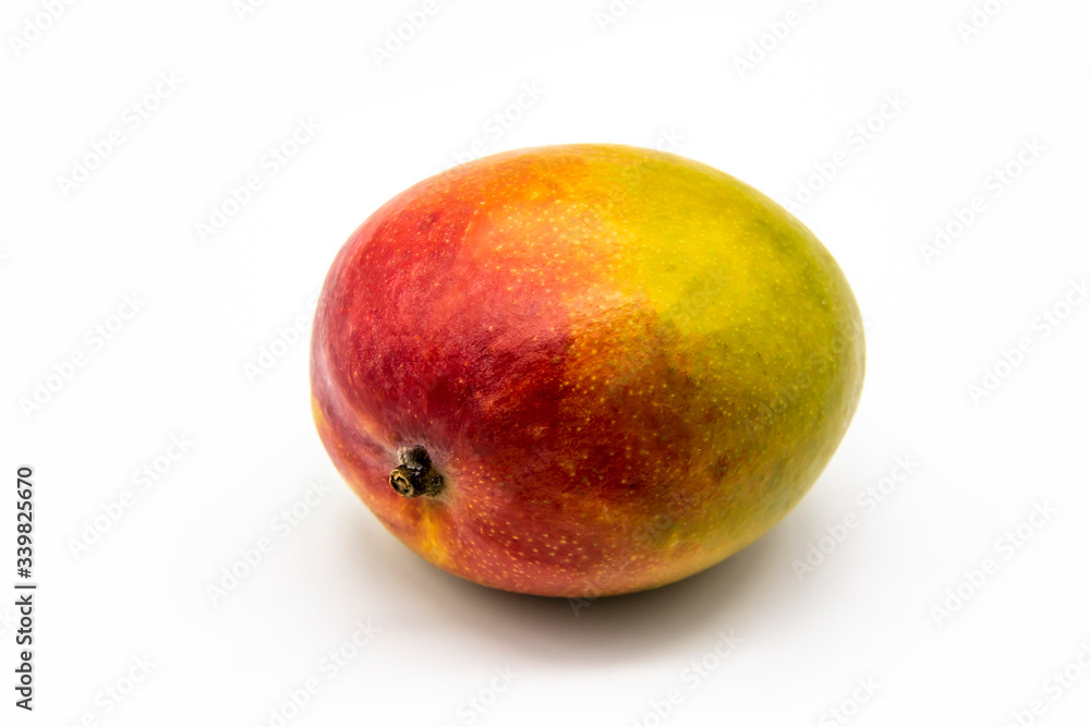 Mango fruit isolated on white background. One ripe mango fruit isolated. Healthy one whole fresh big ripe red mango fruit for the diet meal Mango fruit isolated on white background. One ripe mango fruit isolated. Healthy one whole fresh big ripe red mango fruit for the diet meal