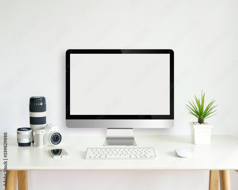 modern computer monitor template mock up on white work desk with blank