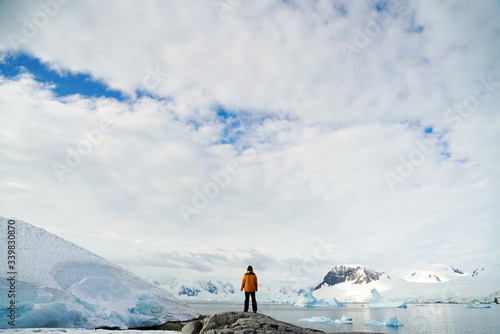 Girl on Top of Snowy Mountain