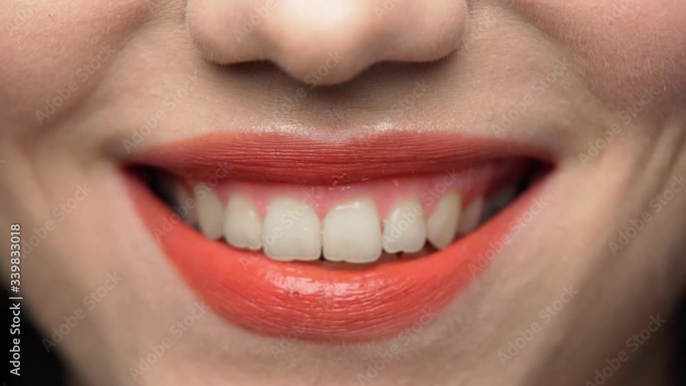 beautiful smile red lips young woman, close-up beautiful smile red lips young woman, close-up