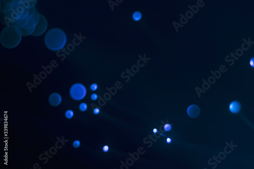 Glowing colored blurred dots. Colored fantasies. Bokeh. © Mikhail