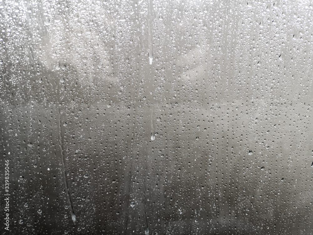 Auto glass in foam and water at a car wash as a backdrop Auto glass in foam and water at a car wash as a backdrop