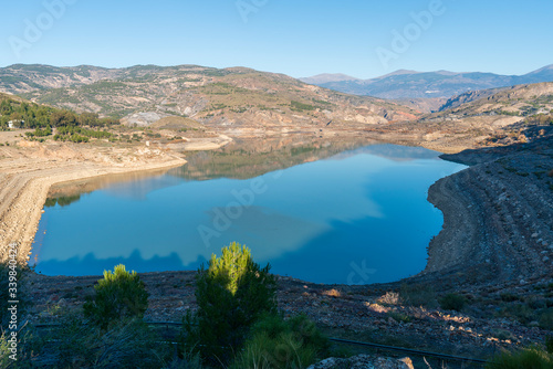 blue waters of the Beninar reservoir (Spain) © Javier