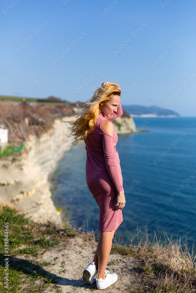 blonde model by the sea at the summer blonde model by the sea at the summer