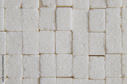 Sugar cube texture. Unhealthy food concept