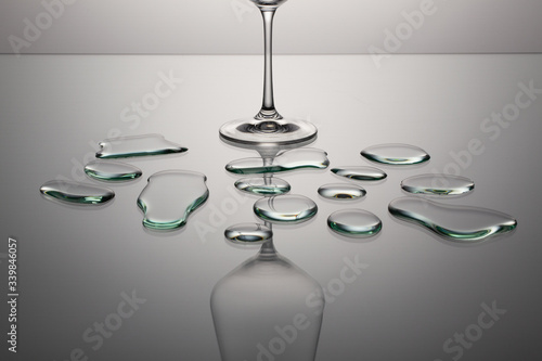 Empty wine glasses on a clean gradient background.