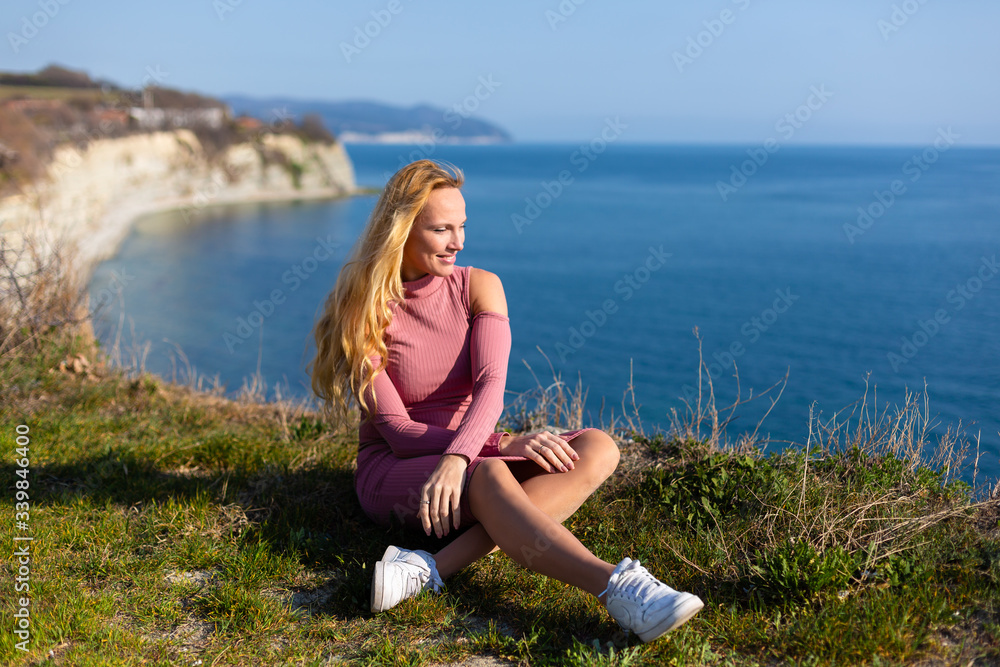 blonde model on the beach at the summer blonde model on the beach at the summer