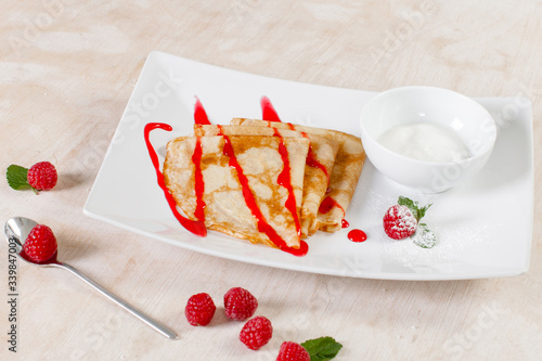 Obraz na płótnie Pancakes with sour cream and jam w salonie