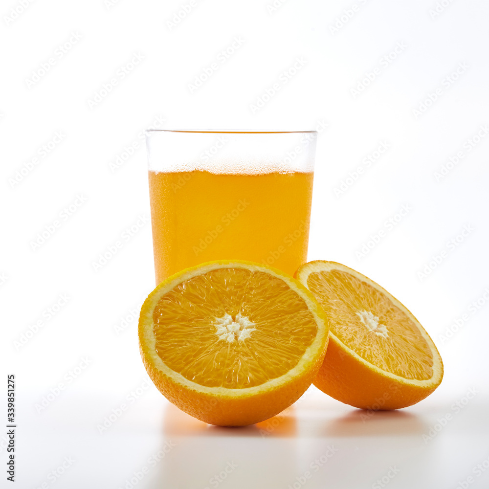 Orange juice and slices of orange Orange juice and slices of orange