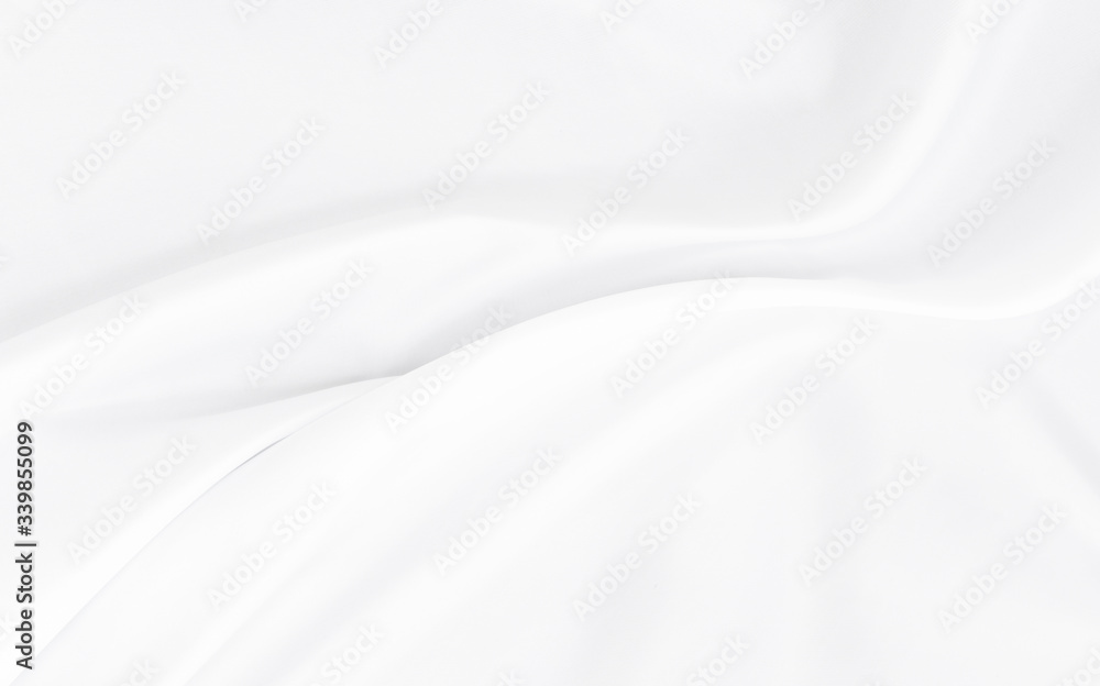 White gray satin texture that is white silver fabric silk background with beautiful soft blur pattern natural.