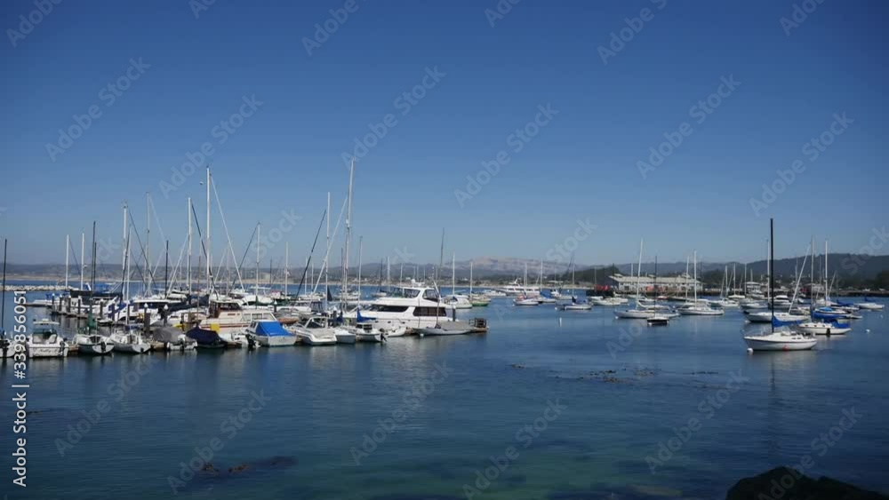 Timelapse of Monterey bay with harbour and boats, California Timelapse of Monterey bay with harbour and boats, California