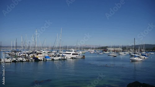 Timelapse of Monterey bay with harbour and boats, California