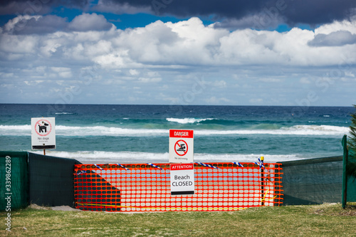 beach closed coronavirus sign, beach closed or shutdown concept amid covid 19 fears and panic over contagious virus spread, 2019-ncov forces international governments to lockdown beaches worldwide