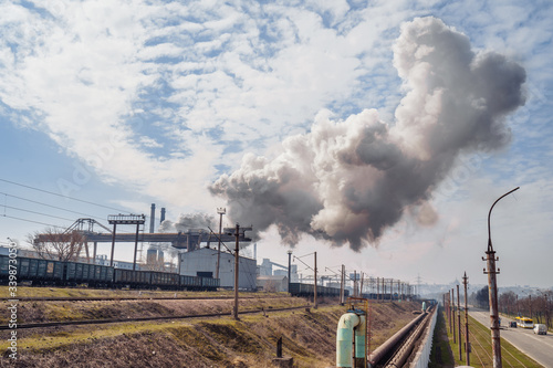 Bad ecology concept. Smoke from the pipes of the factory, metallurgical production plant full cycle. Environmental issues - harmful emissions, air pollution in industrial zone