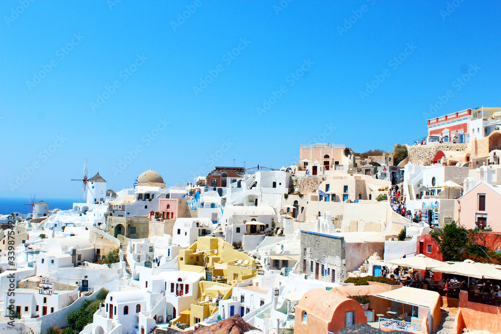 Beautiful Santorini view. Blue sky and white buildings in a good summer day. Santorini Island, Greece.