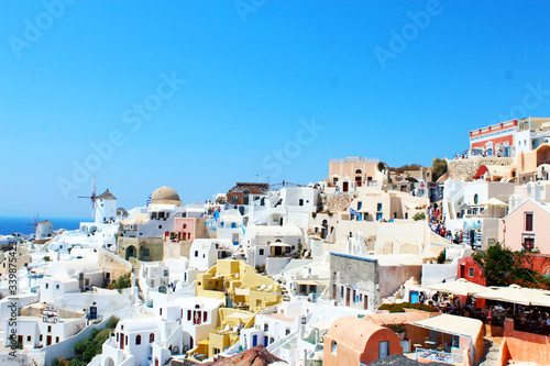 Beautiful Santorini view. Blue sky and white buildings in a good summer day. Santorini Island, Greece.