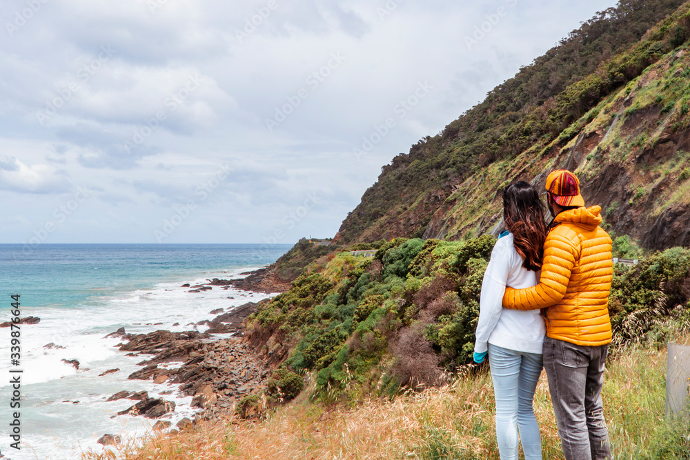 Romantic couple. Coastline beach waves and mountain rocks coastline. turquoise ocean sea, white sand, road trip. Travel, holiday, vacation, journey, paradise. Great Ocean Road. Melbourne Australia
