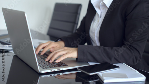 young business woman working on laptop