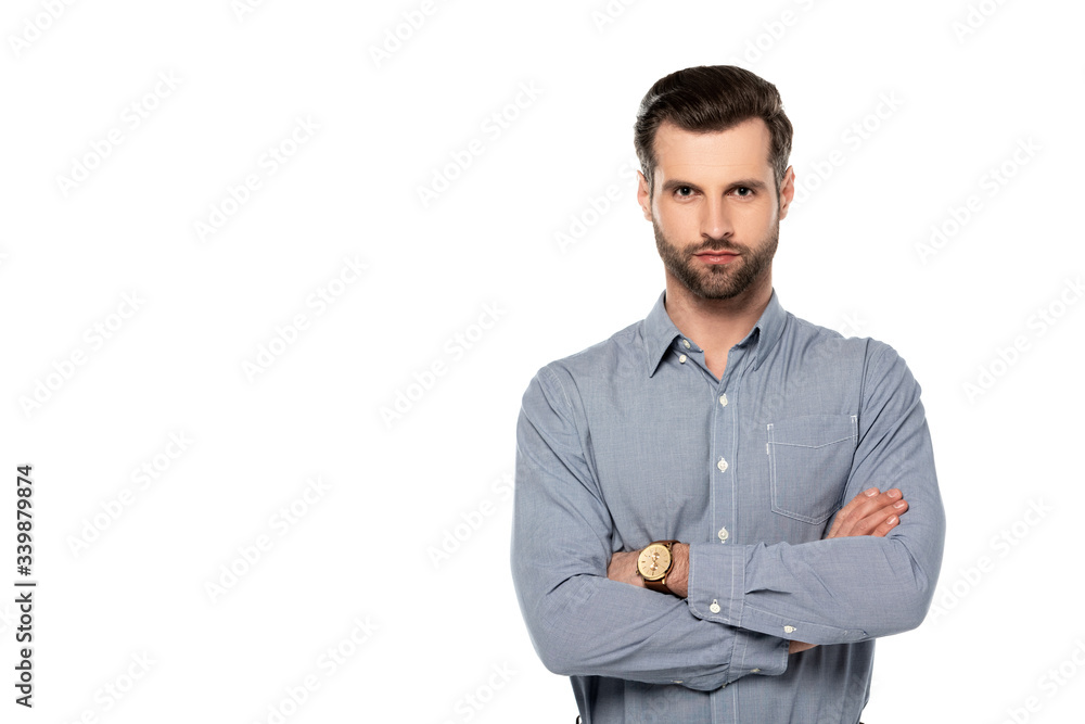 handsome man standing with crossed arms isolated on white