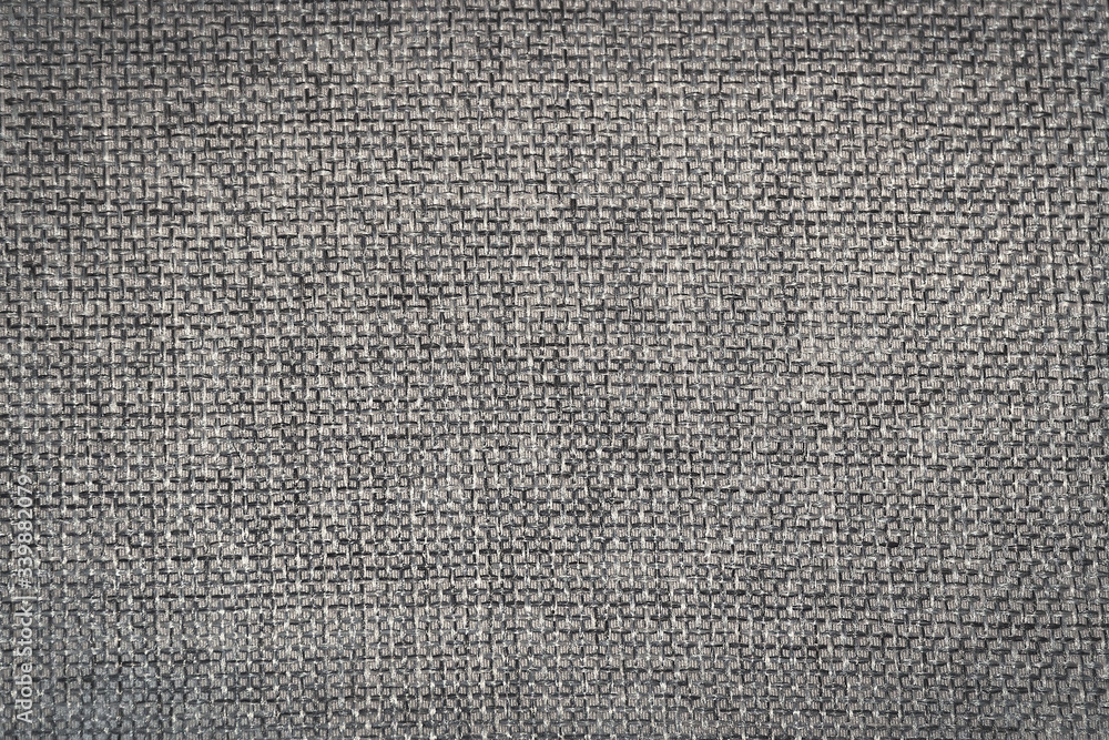 Abstract background of roughly woven grey fabric for design Abstract background of roughly woven grey fabric for design