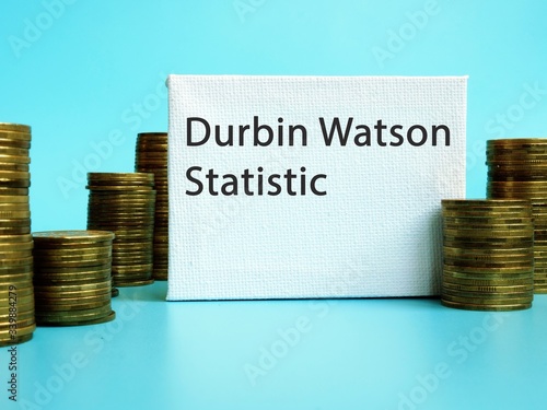 The photo says Durbin Watson Statistic. Notepad, pen, marker. photo