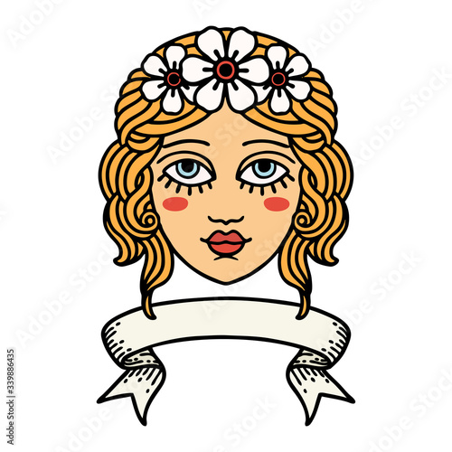 tattoo with banner of female face with crown of flowers