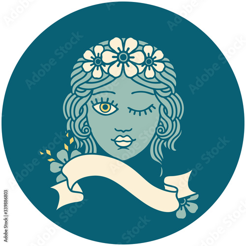 icon with banner of a maiden with crown of flowers winking